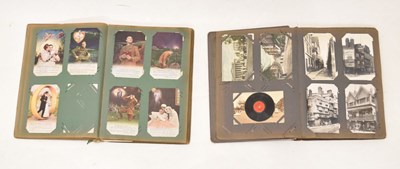 Lot 250 - Two albums of early 20th century postcards