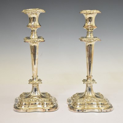 Lot 424 - Pair of 19th century silver plated on copper candlesticks