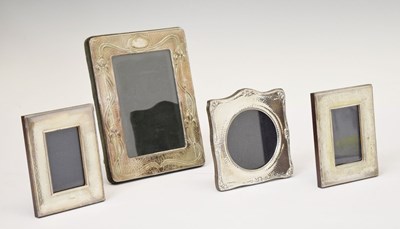 Lot 276 - Four silver mounted easel photograph frames