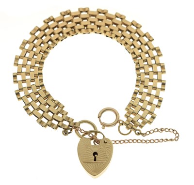 Lot 116 - 9ct gold brick link bracelet with heart-shaped padlock