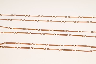 Lot 103 - Yellow metal baton link long guard, tagged 9ct