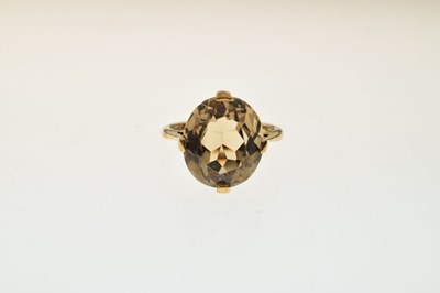 Lot 49 - 9ct gold smoky quartz dress ring