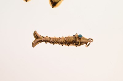 Lot 121 - Pair of acorn design earrings, and an articulated fish pendant