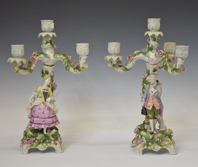 Lot 514 - Pair of German porcelain candelabras