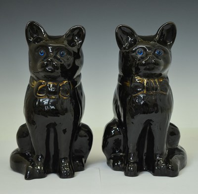 Lot 490 - Pair of glazed terracotta cats