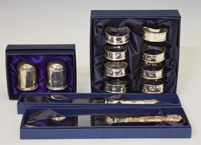 Lot 267 - Set of six Elizabeth II silver napkin rings, salt/pepper set, etc