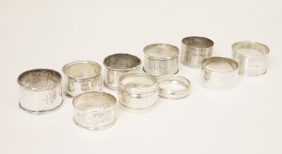 Lot 223 - Ten late 19th/early 20th century silver napkin rings