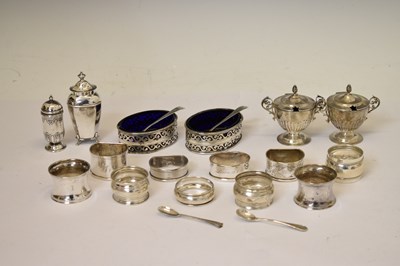 Lot 227 - Collection of silver items to include silver napkin rings, pair of silver of pedestal mustard pots