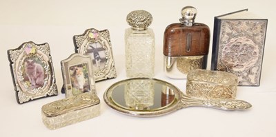 Lot 210 - George V silver-backed hand mirror, three photo frames, etc