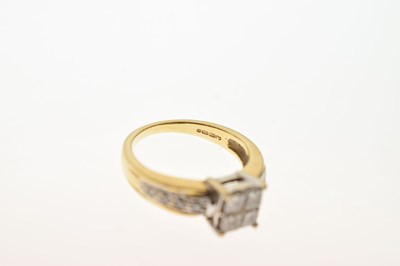 Lot 23 - 18ct gold invisible set princess cut diamond ring