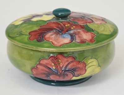 Lot 494 - Moorcroft - 'Hibiscus' pattern powder bowl and cover