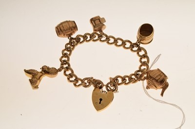 Lot 42 - Gold-plated charm bracelet with 9ct charms