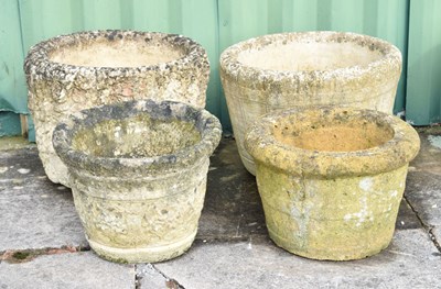 Lot 722 - Four composite stone garden planters