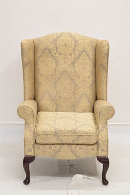 Lot 708 - Modern reproduction wingback chair