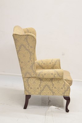 Lot 708 - Modern reproduction wingback chair