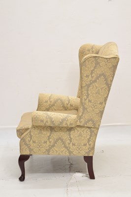 Lot 708 - Modern reproduction wingback chair