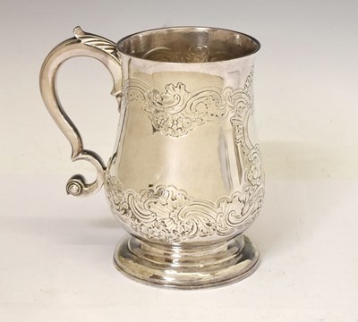 Lot 112 - George II Scottish silver mug with scroll handle