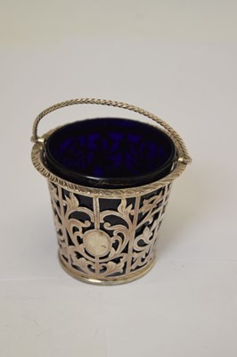 Lot 192 - Edward VII silver preserve basket with swing handle