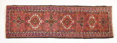 Lot 571 - Middle Eastern red ground wool runner