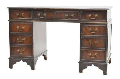 Lot 640 - Reproduction mahogany twin pedestal desk