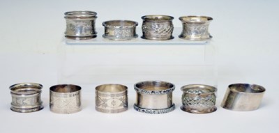 Lot 216 - Collection of ten silver napkin rings