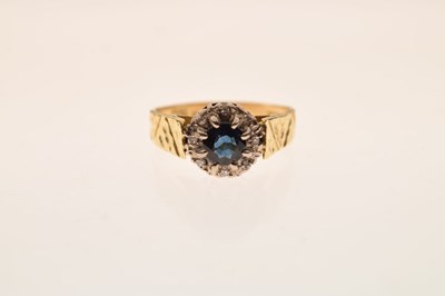 Lot 29 - 18ct gold sapphire and diamond cluster ring