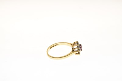 Lot 28 - 18ct gold, ruby and diamond cluster ring