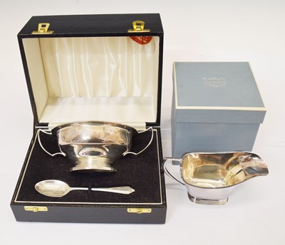 Lot 270 - Silver twin handled bowl and spoon, boxed and a silver sauce boat