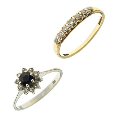 Lot 52 - Sapphire and diamond white gold cluster ring, and a 9ct yellow gold seven-stone diamond ring