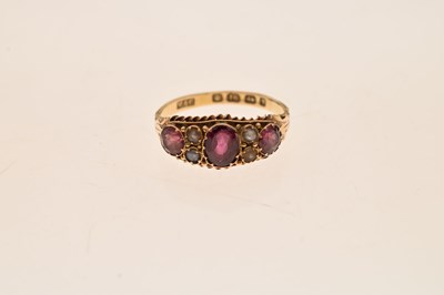 Lot 31 - Victorian garnet and pearl boat head 18ct gold ring