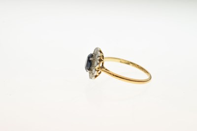 Lot 32 - Sapphire and diamond '18ct & Plat' cluster ring