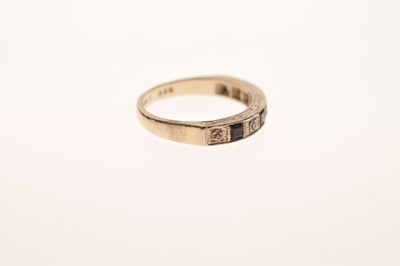 Lot 30 - Sapphire and diamond 18ct white gold half eternity ring