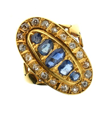 Lot 34 - Multi-stone sapphire and diamond 18ct gold cluster ring