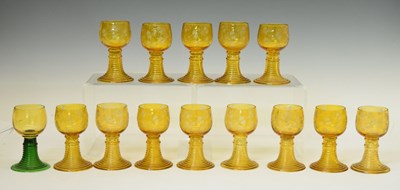 Lot 470 - Fourteen 19th century German amber glass roemers