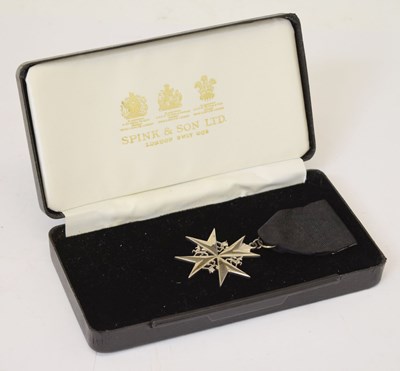 Lot 453 - Order of St. John's officer's silver breast badge