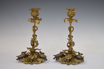 Lot 401 - Pair of late 19th century foliate cast gilt metal candlesticks