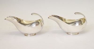 Lot 259 - Pair of silver shaped sauceboats