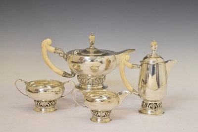 Lot George V silver four-piece tea-set with ivory handles