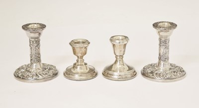 Lot 280 - Two pairs of Elizabeth II silver candlesticks