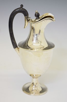 Lot 256 - Late Victorian silver claret jug of urn shaped form