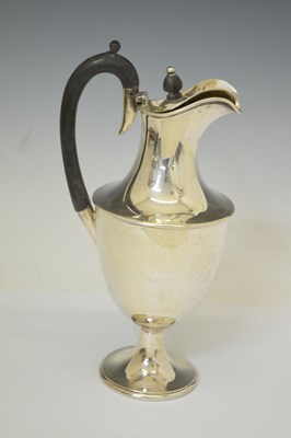 Lot 256 - Late Victorian silver claret jug of urn shaped form