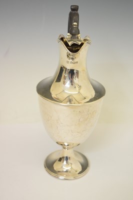 Lot 256 - Late Victorian silver claret jug of urn shaped form
