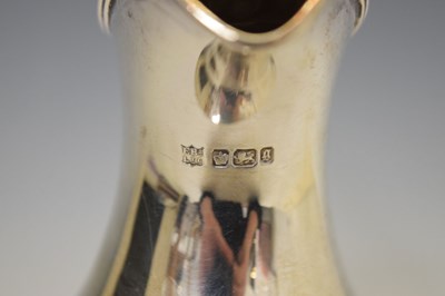 Lot 256 - Late Victorian silver claret jug of urn shaped form