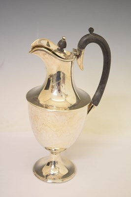 Lot 256 - Late Victorian silver claret jug of urn shaped form