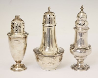 Lot 262 - Three silver sugar casters