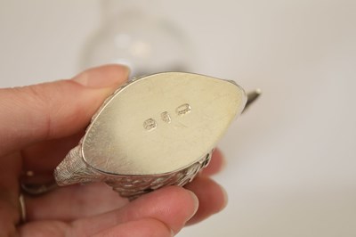 Lot 284 - Silver-mounted continental bottle, together with a pair of salts in the form of swans