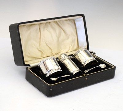 Lot 88 - George V silver three piece condiment set