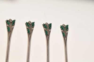 Lot 92 - Cased set of six George V silver spoons with enameled oak leaf and acorn decoration