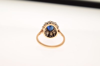 Lot 36 - Sapphire and diamond cluster ring