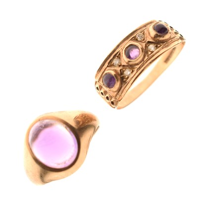 Lot 57 - Amethyst cabochon 9ct gold ring, and an amethyst and diamond 9ct gold ring (2)